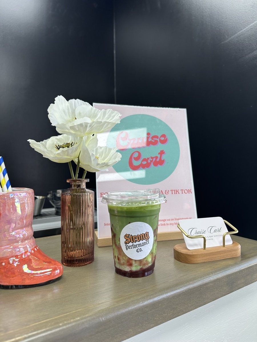 Cruise Cart coffee pop-up with matcha latte and branded sign
