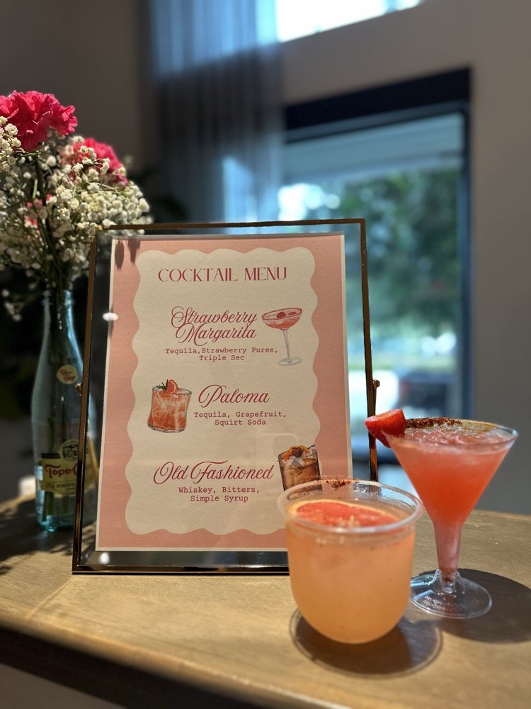 Custom cocktail menu with strawberry margarita
