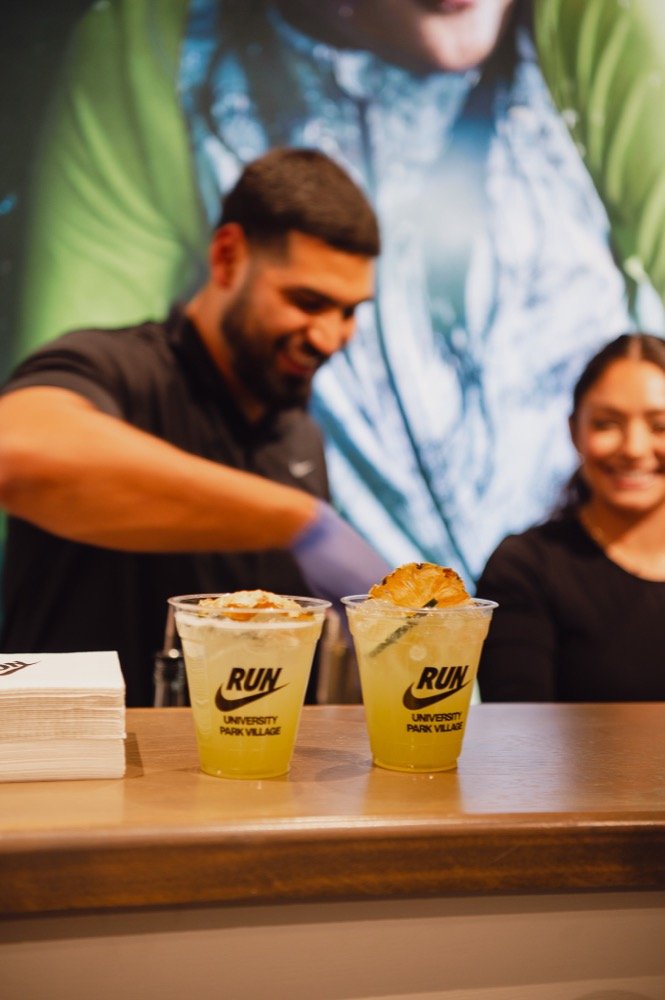 Cruise Cart bartenders serving craft cocktails at a corporate event